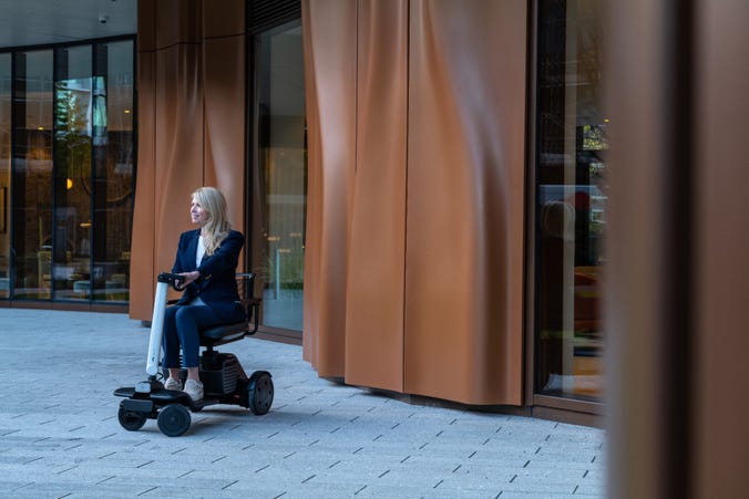 WHILL Model R 4W Scooter
