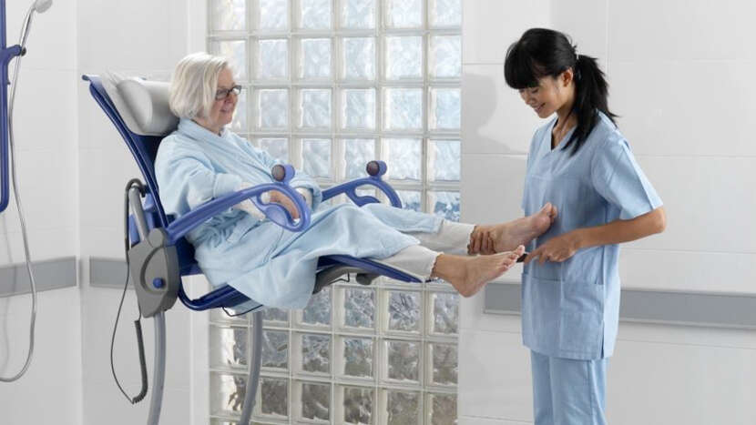 ArjoHuntleigh Carino Height-Adjustable Shower and Hygiene Chair