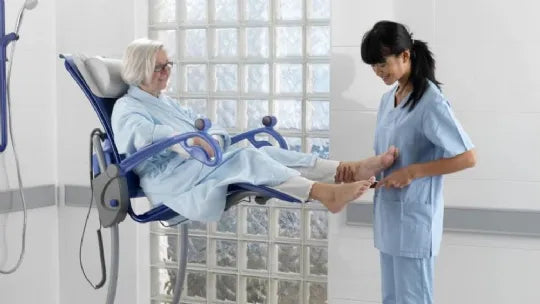Carino Height-Adjustable Shower and Hygiene Commode Chair by ArjoHuntleigh (FULLY ASSEMBLED)